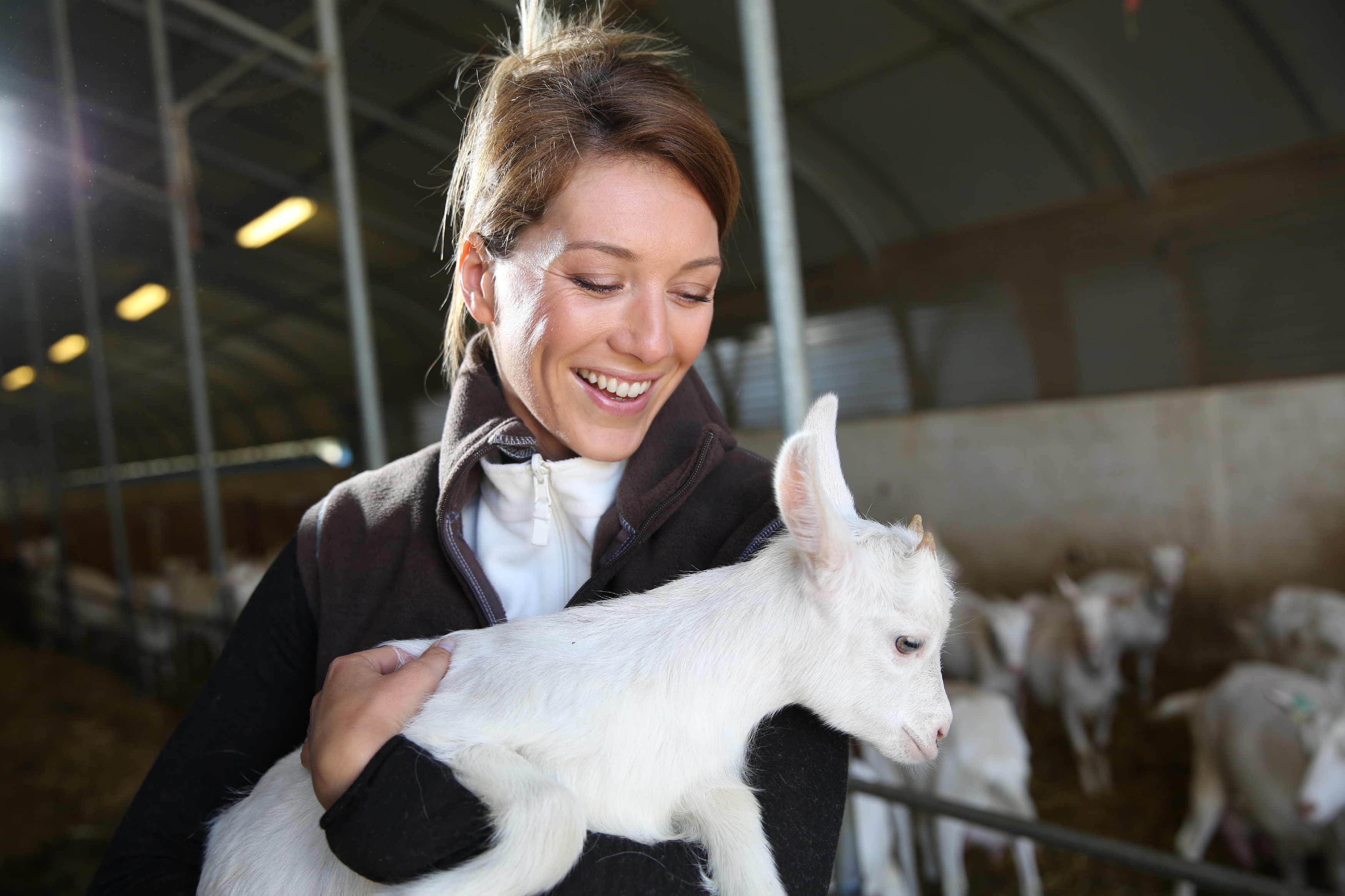 Landwirtin mit Zicklein